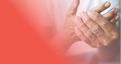 Elderly hands clasped together