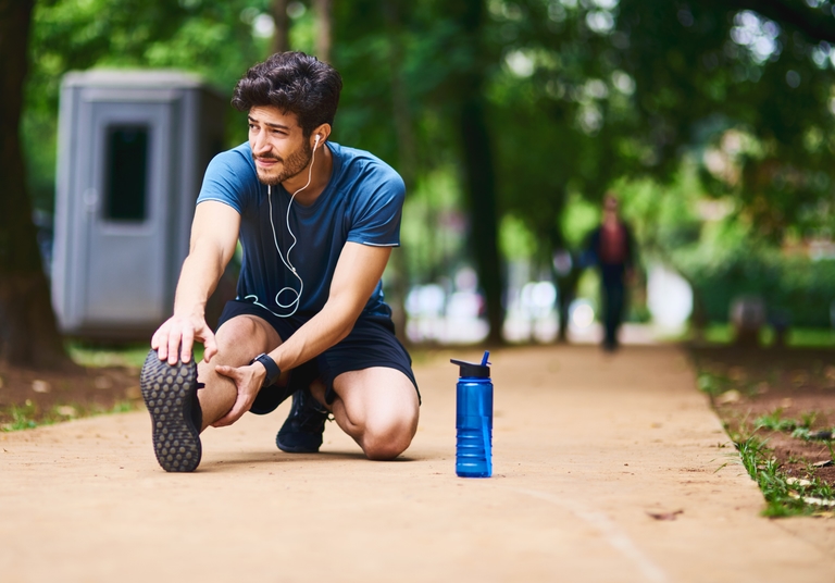 Man resting after exercise outdoors